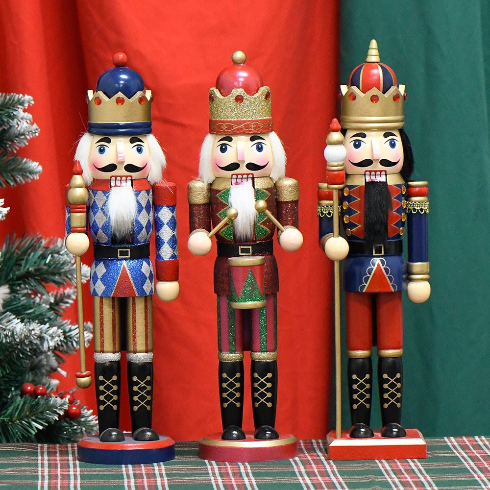 Decorative wooden nutcracker with cape