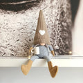 Decorative gnome with coffee cup