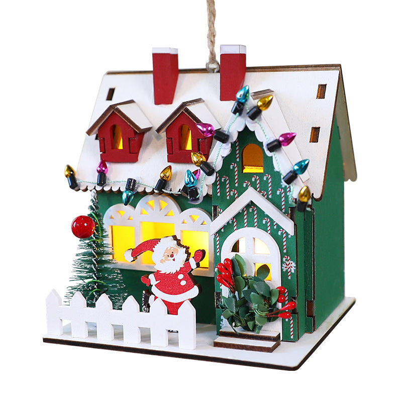 Decorative wooden Christmas house as hanging decoration or display piece