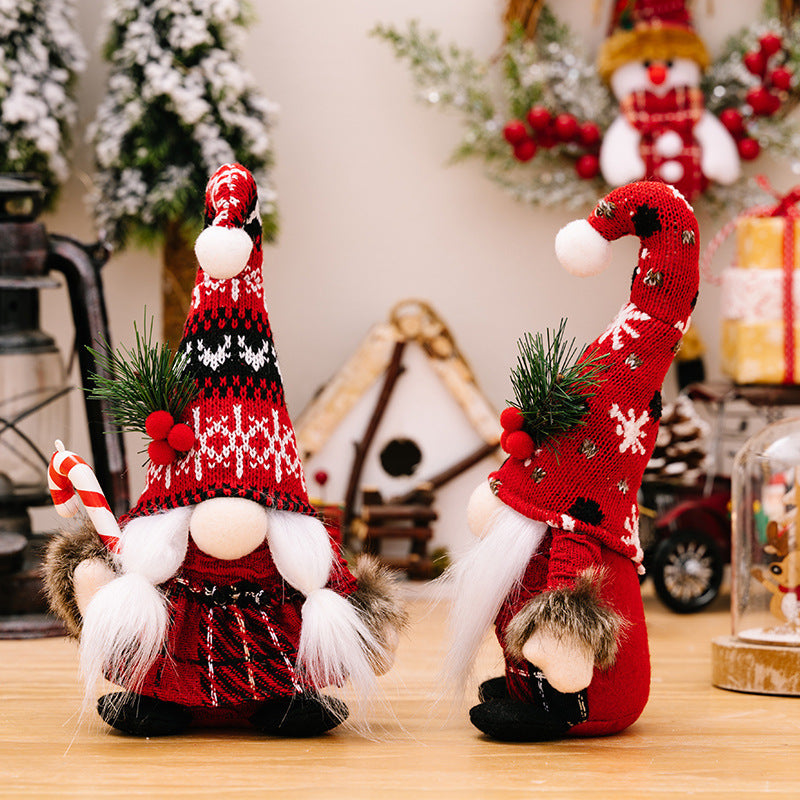 Christmas elf figure with knitted hat, standing