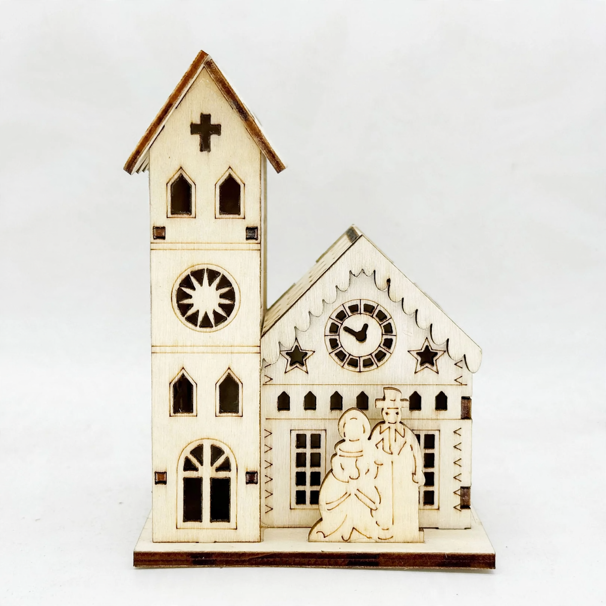 Illuminated wooden house for Christmas decoration