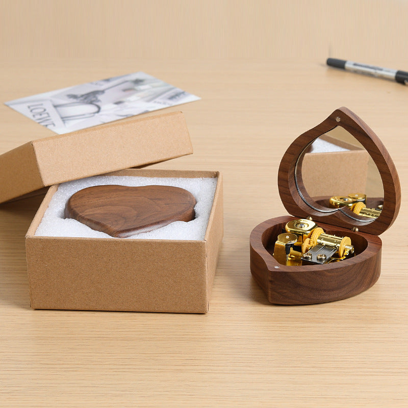 Wooden music box in heart shape with mirror