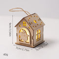Illuminated wooden house as Christmas decoration