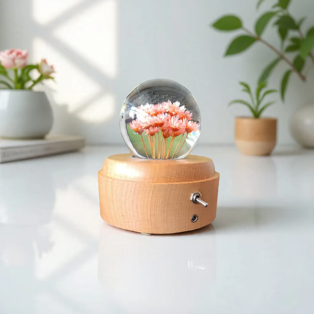 Crystal ball music box with rotating base and dried flowers