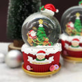 Christmas snow globe with music and light