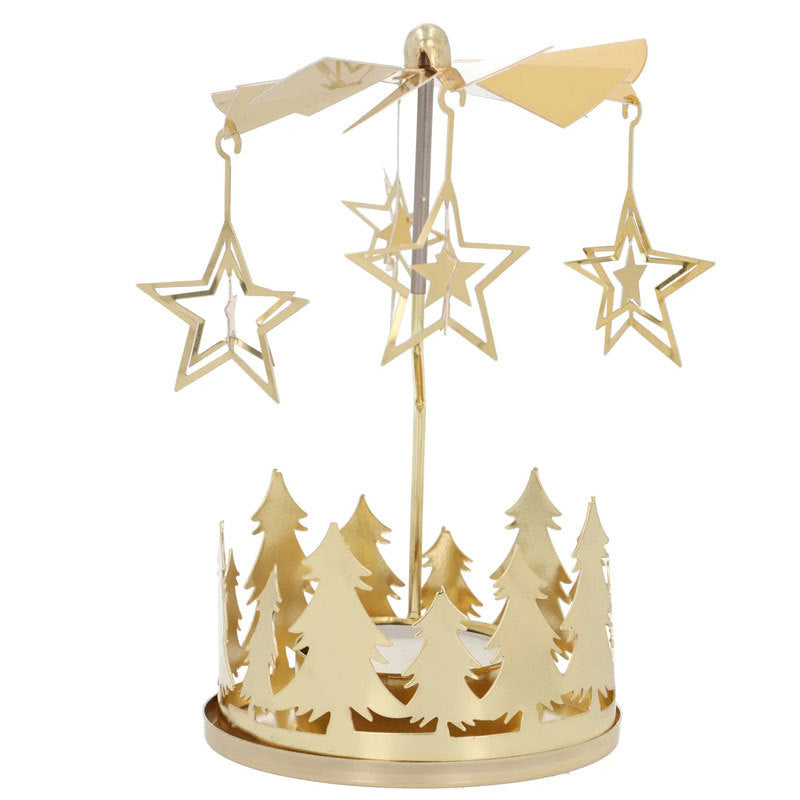 Rotating tea light holder made of brass with star motif