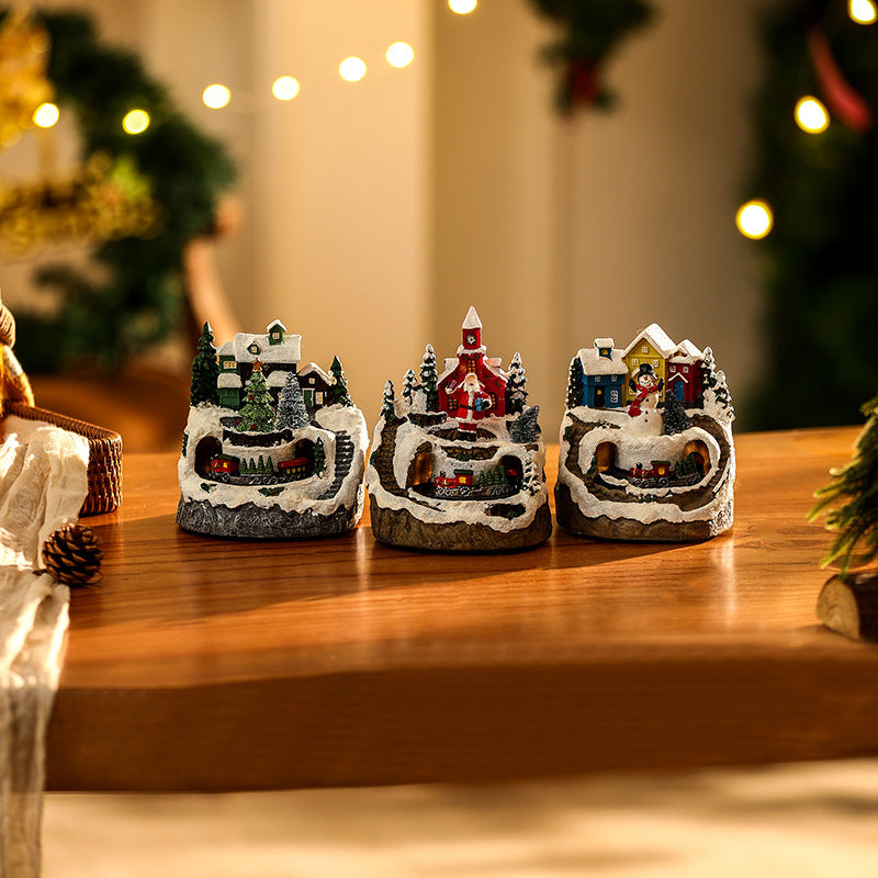 Illuminated Christmas village scene with snowman Yeouu