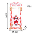 Decorative Santa Claus figure on swing