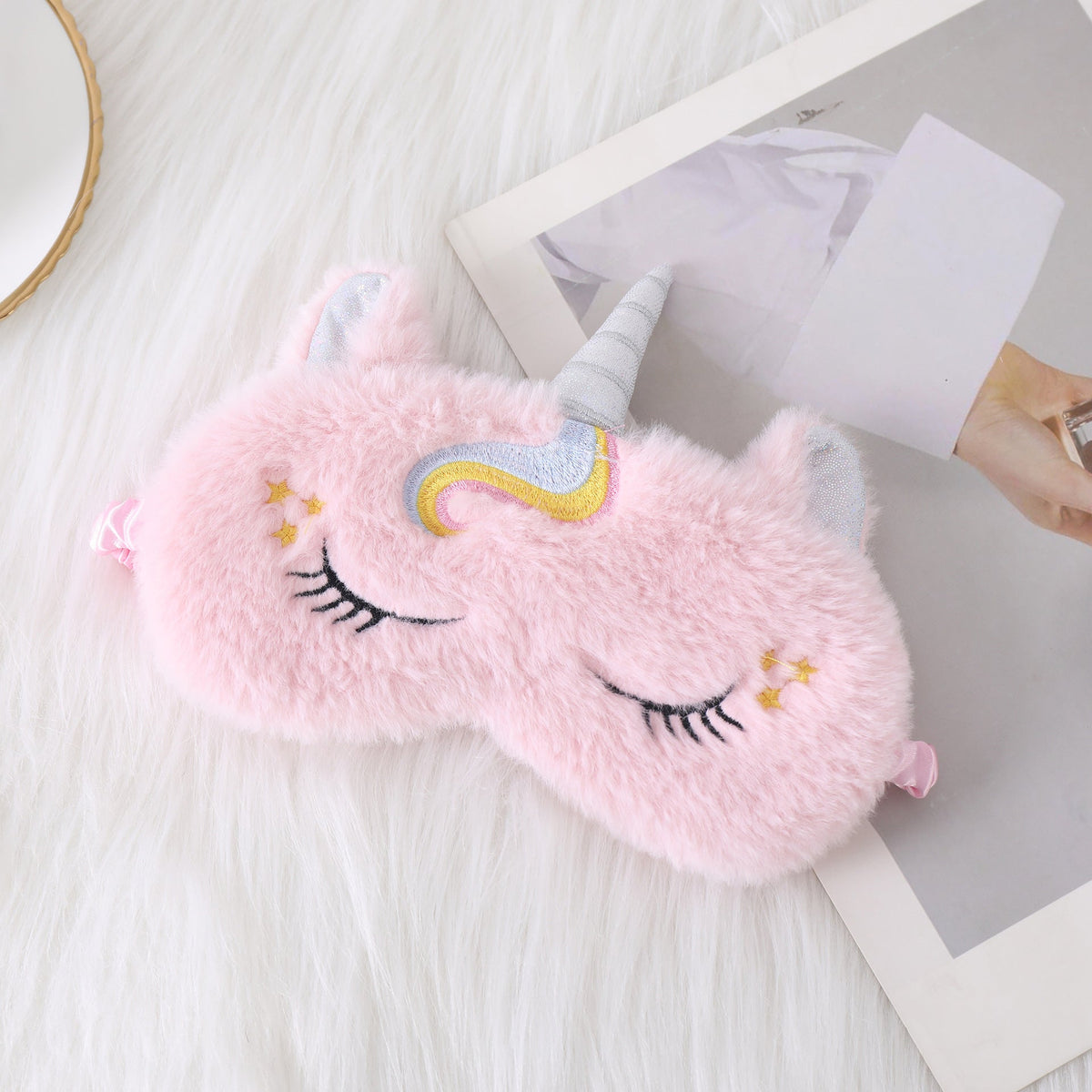 Ladies nan cozy unicorn sleep mask with embroidered eyelashes, soft plush and elastic ruffled ribbon 
Maetiva